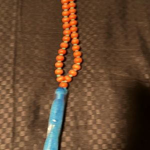 Sweater necklace wood beads and blue accents